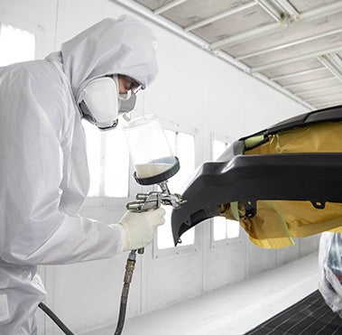 Collision Center Technician Painting a Vehicle | Hamilton Toyota in Clovis NM