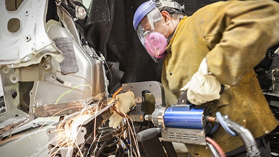 Collision Center Technician Repairing Vehicle | Hamilton Toyota in Clovis NM